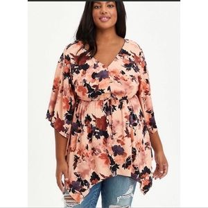 Flowy orange and floral top from Torrid.